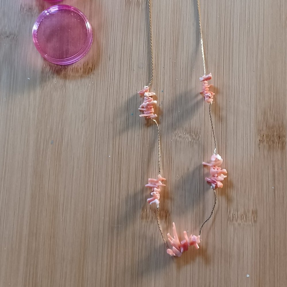 salmon coral on gold chain necklace